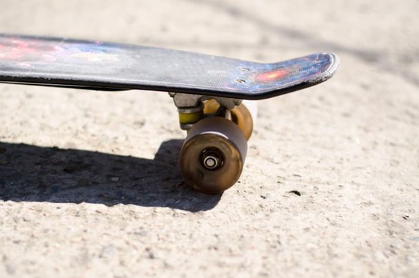 Children's skate on the playground. Penny board close up. - Photo, Image