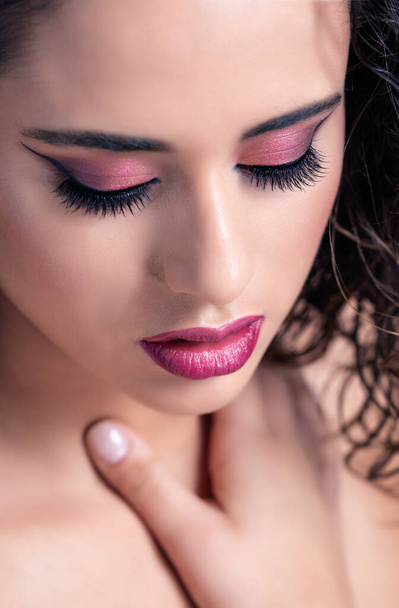 Details of a beauty makeup in berry shades - Fotó, kép