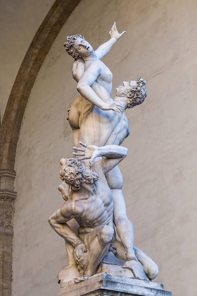 The Rape of the Sabine Women. White marble sculpture by Giambologna. Composition with the figura serpentina, an upward snakelike spiral movement. Piazza della Signoria, Florence, Tuscany, Italy. - Fotó, kép
