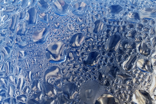 Gotas de plástico de superficie de agua
 - Foto, imagen