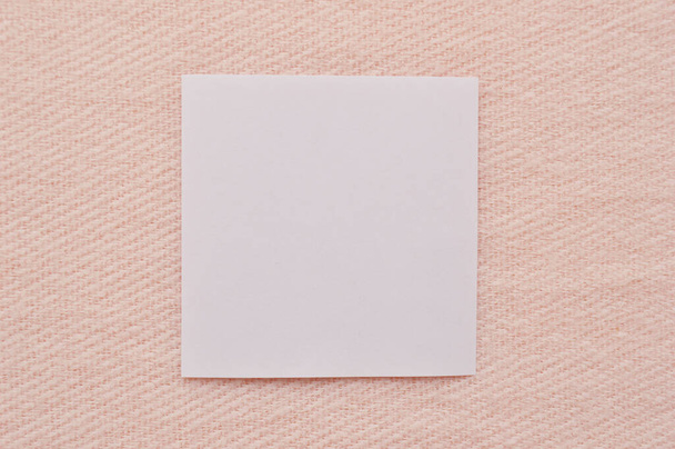 Paper bird step by step instructions. White paper on a pink background. Step 1 - Fotoğraf, Görsel