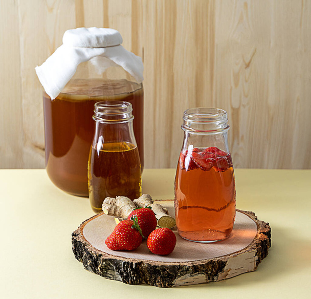 Homemade fermented kombucha tea with berry and ginger - Photo, Image