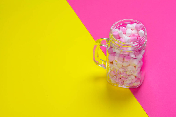 minimal sweet marshmallow on color background. Close up. - Foto, afbeelding