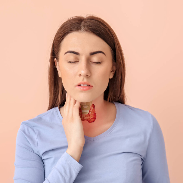 Woman with thyroid gland problem on color background  - Photo, Image