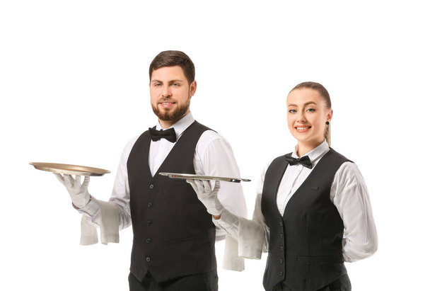 Άνδρες και γυναίκες σερβιτόροι σε λευκό φόντο - Φωτογραφία, εικόνα