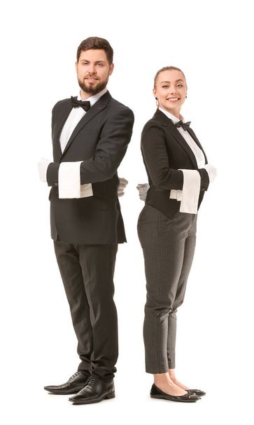 Male and female waiters on white background - Photo, Image