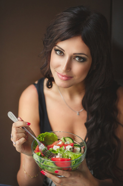 Portrait of a young woman. salad - Foto, Imagem