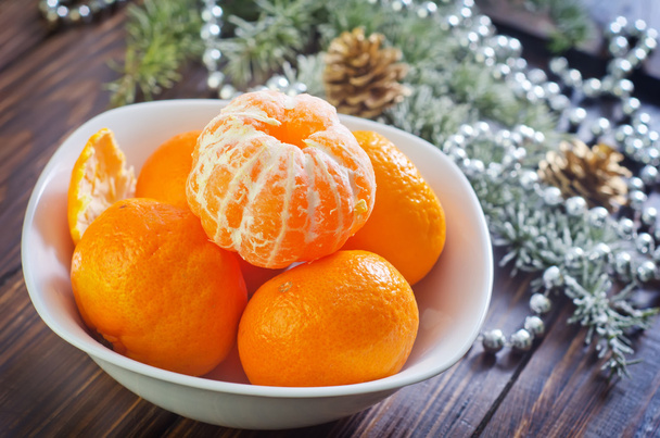 Mandarins in a bowl - Фото, изображение