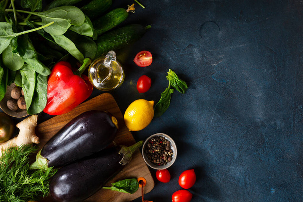 Fresh organic food overhead on dark background, copy space - Valokuva, kuva