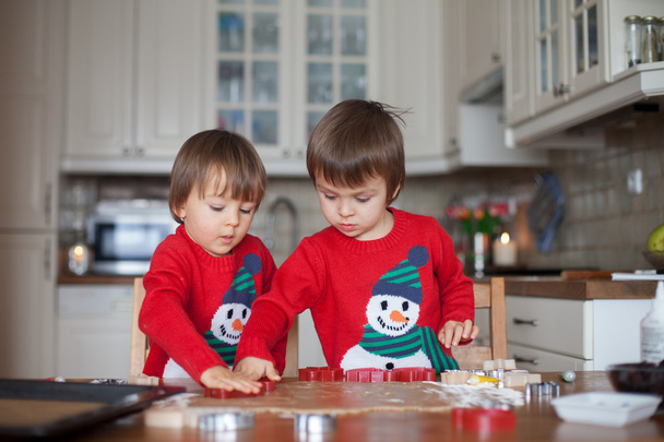 Boys, baking ginger cookies for christmas - Photo, image