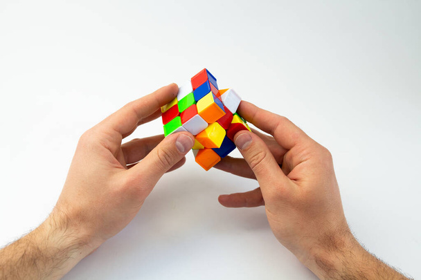 logical cube puzzle in hands - Foto, Imagem