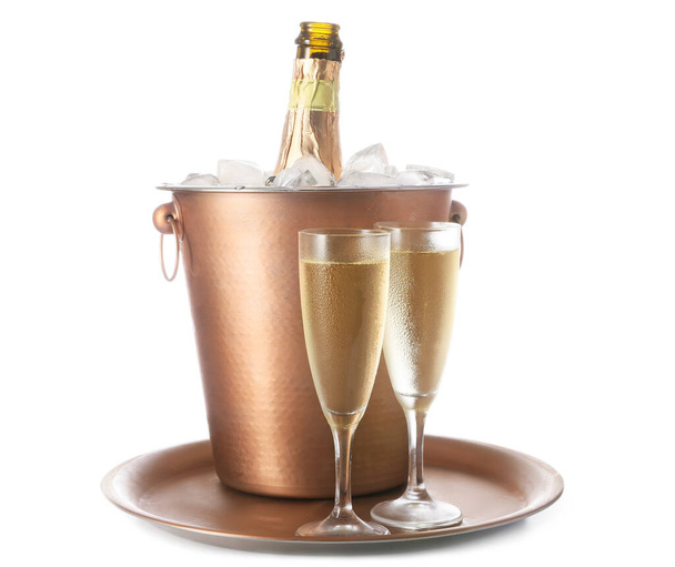 Bucket with bottle and glasses of champagne on white background - Photo, Image