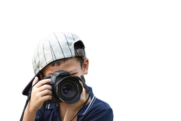Hand boy holding the camera Taking pictures on a white background. - Photo, Image
