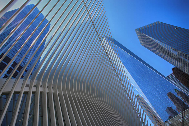 New York, USA  August 24, 2018 Exterior of the building One World Trade Center and Oculus ribs (WTC Transportation Hub) in New York, USA - Foto, Imagem