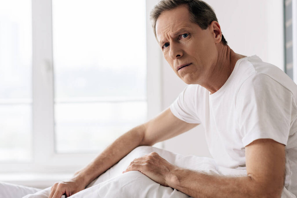 depressed man feeling unwell and looking at camera - Photo, Image