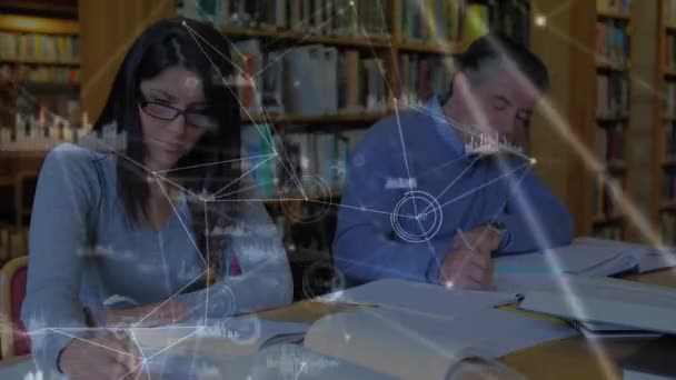 Animation of a couple sitting by a desk, writing on their notebooks over a web of connection in the background.  - Séquence, vidéo