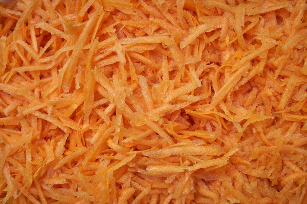 Grated carrot, for backgrounds or textures.Carrots close-up. Homemade food - Φωτογραφία, εικόνα