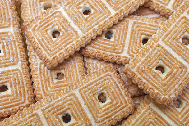 Galletas dulces con granos de azúcar macroshot forma rectangular
 - Foto, imagen
