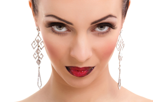 beautiful young woman posing with bright red lips and jeweller - Foto, imagen