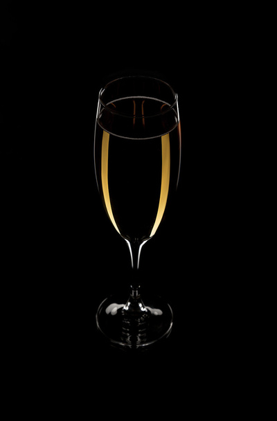 Glass of luxury champagne low key photo - Фото, изображение