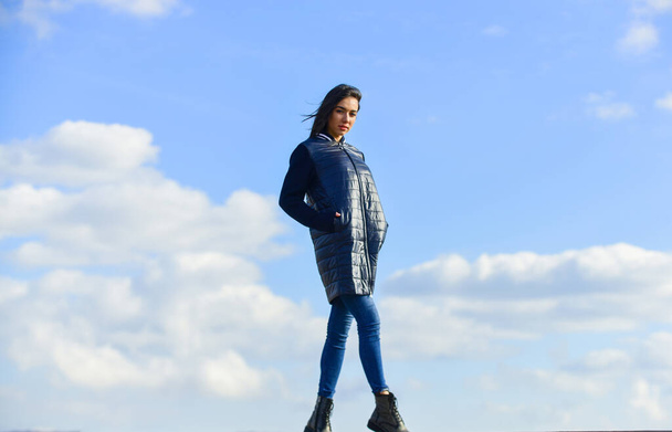 Walking alone. Dreamy girl. Young and free concept. Expect more from your clothes. Woman enjoy weather outdoors. Beauty and fashion. Woman on blue sky background. Winter vacation. Long jacket coat - Φωτογραφία, εικόνα