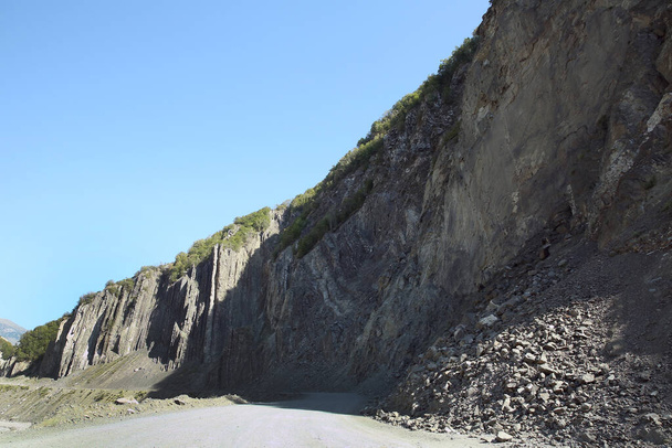  Mountainous road leading to Lahic village in Ismayilli region of Azerbaijan, with car. Mountains Rocks - Photo, Image