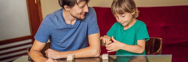 Happy Family Playing Board Game At Home BANNER, LONG FORMAT - Foto, Imagen