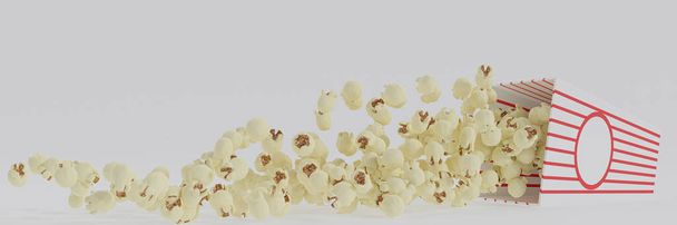 Butter Popcorn in rot-weiß gestreiftem Pappeimer isoliert auf weißem Hintergrund - Foto, Bild