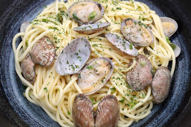 Close up of Vongole spaghetti in a dish  - Photo, image