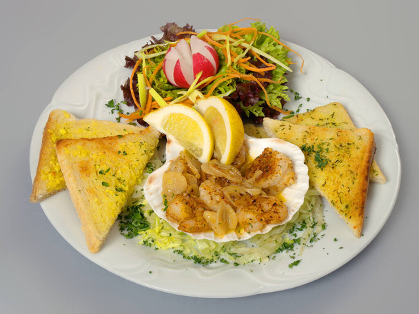 Shrimp salad with toasts and vegetable garnish. - Photo, Image