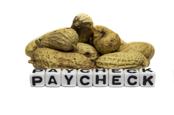 Cacahuetes en cheque de pago
 - Foto, Imagen