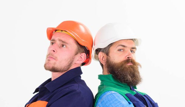 Men in hard hats and uniform, builders - Φωτογραφία, εικόνα