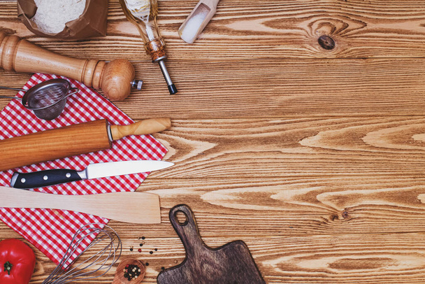 Cooking utensils on wooden background, top view. - Foto, Imagem