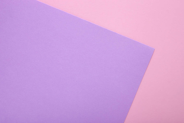 背景としてピンクと紫の紙。2色のパステルの紙の質感、テキストのための場所とトップビュー - 写真・画像