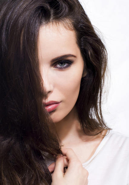 Beauty woman face with haircut. Brunette.Brown hair. - 写真・画像