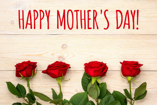 happy mother's day! red roses on wooden table - Photo, image