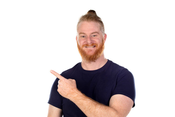Red haired man with long beard isolated on a white background - Foto, afbeelding