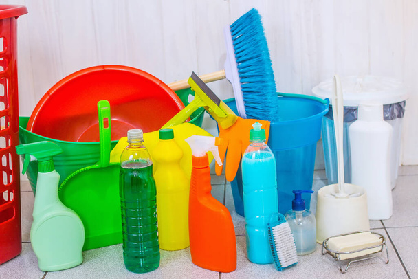 variety of cleaning products on the floor - closeup - Foto, imagen