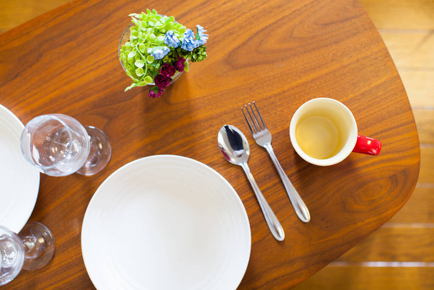 Dining table ready for home party in the living room at home - 写真・画像