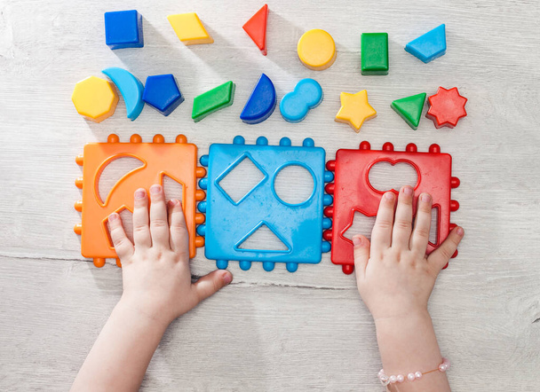 Sorting montessori training. Gray background. Objects and forms for games and learning by children. - Foto, imagen