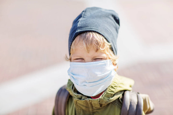 small boy in protectionmask outdoor - Foto, imagen
