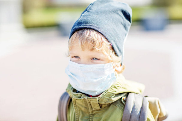 small boy in protectionmask outdoor - Φωτογραφία, εικόνα