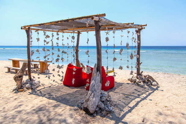 exotic beach umbrella and sunbed, gili trawangan island, Bali, Indonesia. - Photo, Image