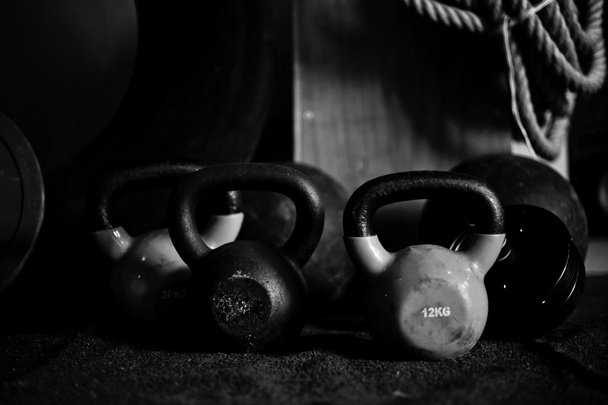 Gym Equipment with a dramatic light - Photo, Image