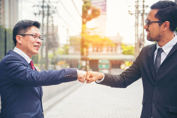 Partner Business Trust Teamwork Partnership. Industry contractor fist bump dealing mission business. Mission team meeting group of People Fist bump Hands together. Business trust teamwork Concept - Photo, Image