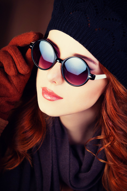 Style redhead women in sunglasses. - Photo, Image