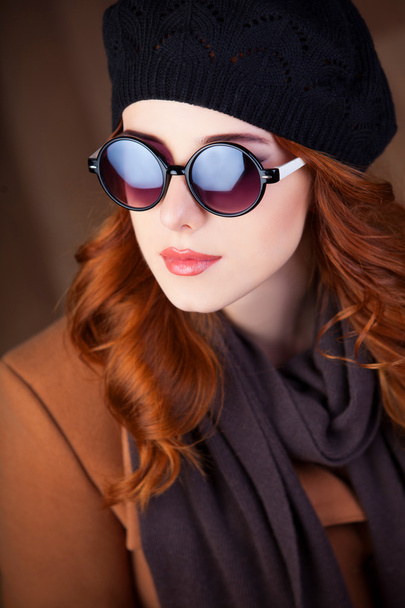 Style redhead women in sunglasses. - Photo, Image