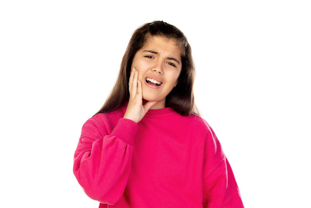 Adorable preteen girl with pink jersey isolated on a white background - Photo, Image