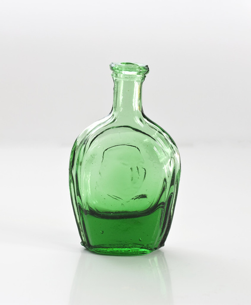 Studio captured green bottle on white background - 写真・画像