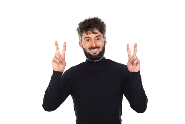 Young man in black isolated on a white background - Photo, Image